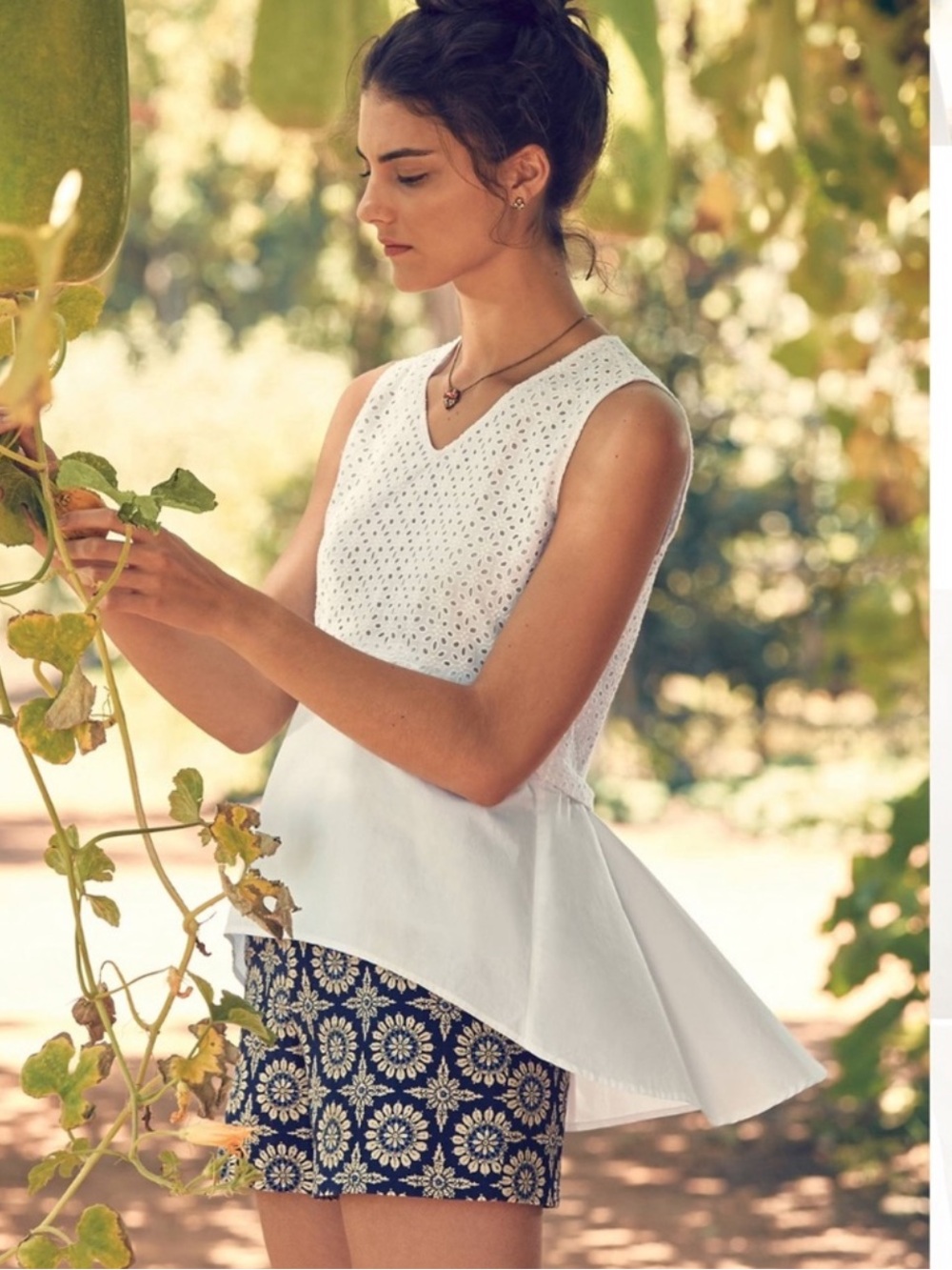 Anthropologie $88 HD in Paris White Eyelet Cutout Empire Waist Flounce Top